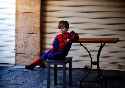child in spiderman costume
